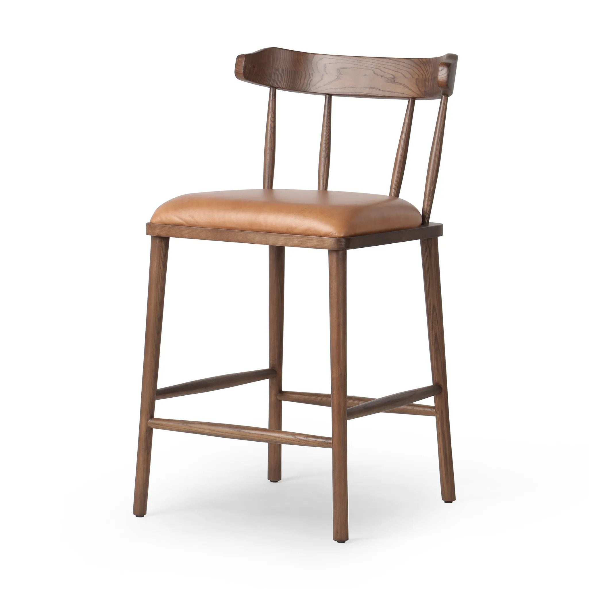 Made from solid ash with a vintage finish, this versatile counter stool pairs an airy back with tapered spindles, for a simple, inviting look. A fixed upholstered seat of top-grain leather adds a smart, comfortable touch Amethyst Home provides interior design, new home construction design consulting, vintage area rugs, and lighting in the Washington metro area.