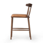 Made from solid ash with a vintage finish, this versatile counter stool pairs an airy back with tapered spindles, for a simple, inviting look. A fixed upholstered seat of top-grain leather adds a smart, comfortable touch Amethyst Home provides interior design, new home construction design consulting, vintage area rugs, and lighting in the Winter Garden metro area.