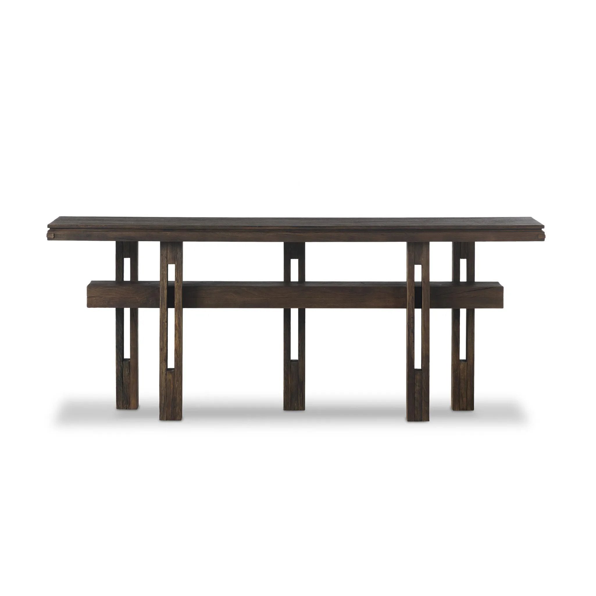 Crafted from smoked alder, this Wabi Sabi-inspired console brings an organic look to your space. With staggered legs, chamfered edges and a central stretcher, this piece is perfect for media display or styled in the living room or entryway Amethyst Home provides interior design, new home construction design consulting, vintage area rugs, and lighting in the Los Angeles metro area.