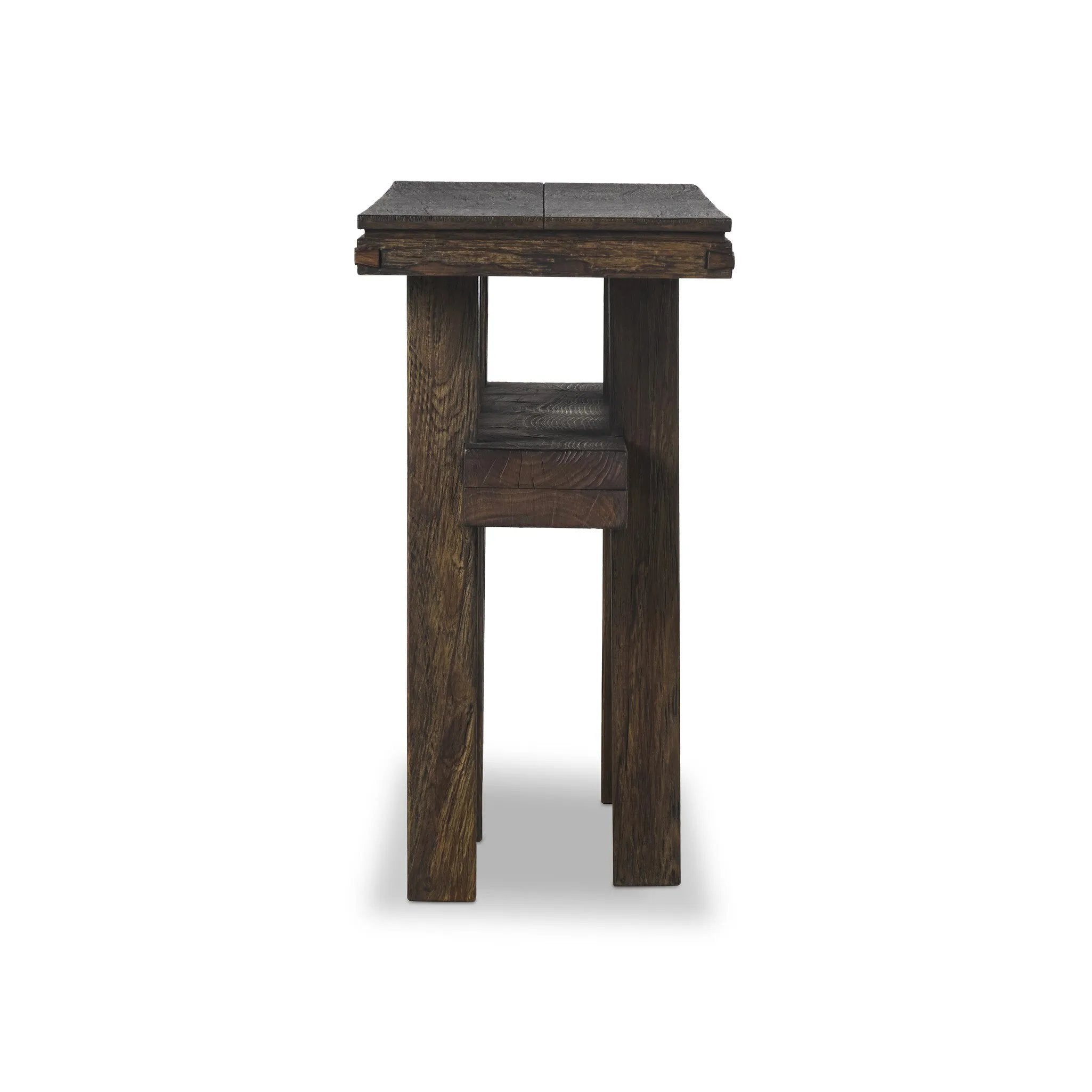 Crafted from smoked alder, this Wabi Sabi-inspired console brings an organic look to your space. With staggered legs, chamfered edges and a central stretcher, this piece is perfect for media display or styled in the living room or entryway Amethyst Home provides interior design, new home construction design consulting, vintage area rugs, and lighting in the Salt Lake City metro area.