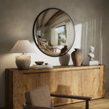 Featuring Convex Iron Matte Black Wall Mirror by Four Hands at Amethyst Home. A slim frame in black-finished iron cradles this oversized mirror's convex curve. Bold yet refined, it amplifies space and light as a captivating focal point.Overall Dimensions: 46.50"w x 5.00"d x 46.50"hWeight : 56.31 lbsMaterials : Iron. Amethyst Home provides interior design, new home construction design consulting, vintage area rugs, and lighting in the Park City metro area.