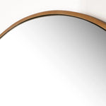 A slim frame in vintage brass-finished iron cradles this oversized mirror's convex curve. Bold yet refined, it amplifies space and light as a captivating focal point Amethyst Home provides interior design, new home construction design consulting, vintage area rugs, and lighting in the Austin metro area.