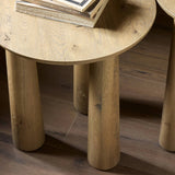Featuring Cooper Drifted Oak Nesting End Table by Four Hands at Amethyst Home. A chamfered top and tapered legs define the artisanship of this three-leg end table. Crafted from drifted oak veneer, its natural texture and clean design make a clever addition to any room. Overall Dimensions: Tall:
14.00"w x 14.00"d x 21.00"h
 Short:
17.50"w x 17.50"d x 19.00"h. Amethyst Home provides interior design, new home construction design consulting, vintage area rugs, and lighting in the Austin metro area.