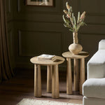 Featuring Cooper Drifted Oak Nesting End Table by Four Hands at Amethyst Home. A chamfered top and tapered legs define the artisanship of this three-leg end table. Crafted from drifted oak veneer, its natural texture and clean design make a clever addition to any room. Overall Dimensions: Tall:
14.00"w x 14.00"d x 21.00"h
 Short:
17.50"w x 17.50"d x 19.00"h. Amethyst Home provides interior design, new home construction design consulting, vintage area rugs, and lighting in the Houston metro area.