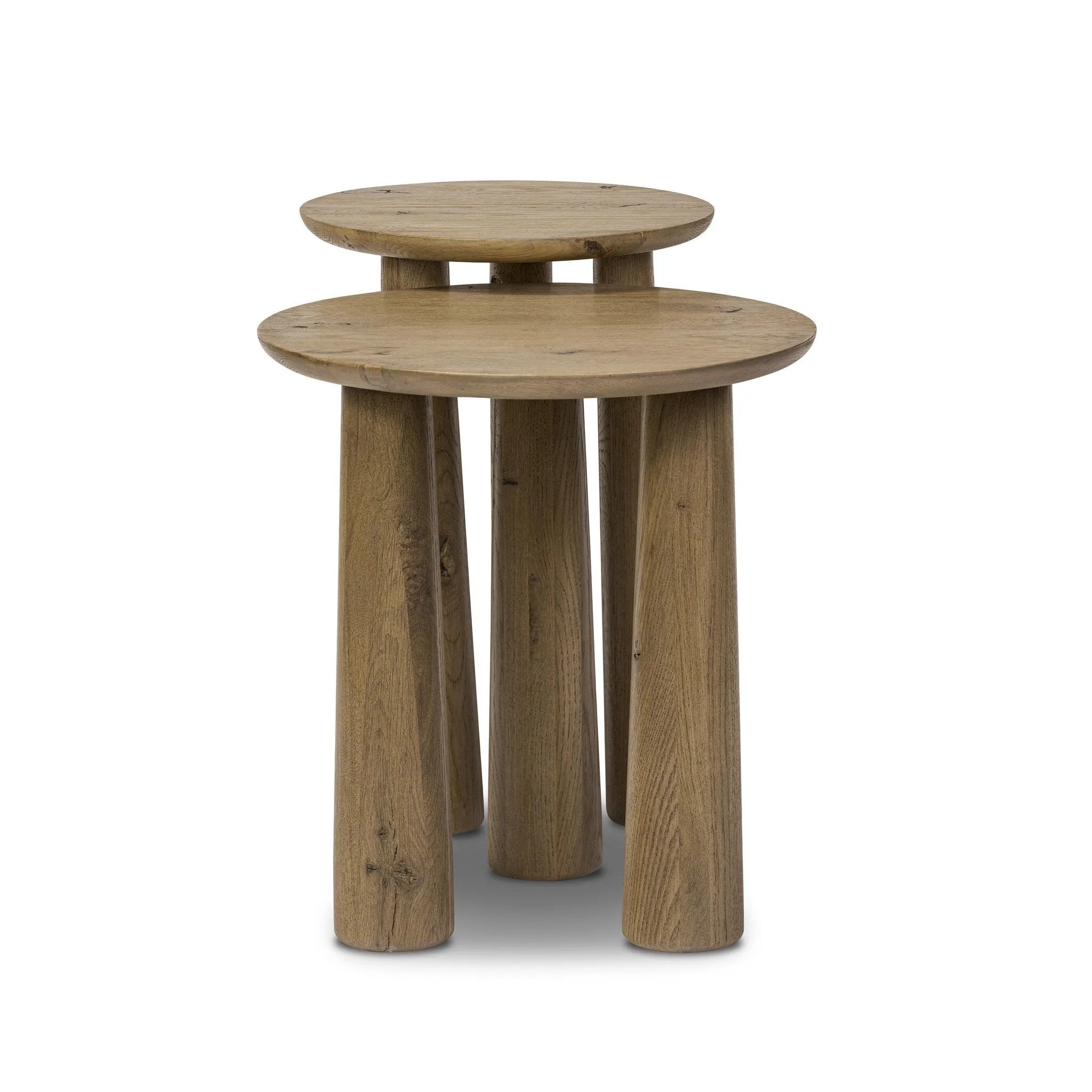 Featuring Cooper Drifted Oak Nesting End Tables by Four Hands at Amethyst Home. Chamfered tops and tapered legs define the artisanship of these three-leg nesting tables. Crafted from drifted oak veneer, their natural texture and clean design make them a clever addition to any room, whether styled together or apart. Overall Dimensions: 17.50"w x 17.50"d x 21.00. Amethyst Home provides interior design, new home construction design consulting, vintage area rugs, and lighting in the Boston metro area.