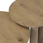 Featuring Cooper Drifted Oak Nesting End Tables by Four Hands at Amethyst Home. Chamfered tops and tapered legs define the artisanship of these three-leg nesting tables. Crafted from drifted oak veneer, their natural texture and clean design make them a clever addition to any room, whether styled together or apart. Overall Dimensions: 17.50"w x 17.50"d x . Amethyst Home provides interior design, new home construction design consulting, vintage area rugs, and lighting in the Los Angeles metro area.