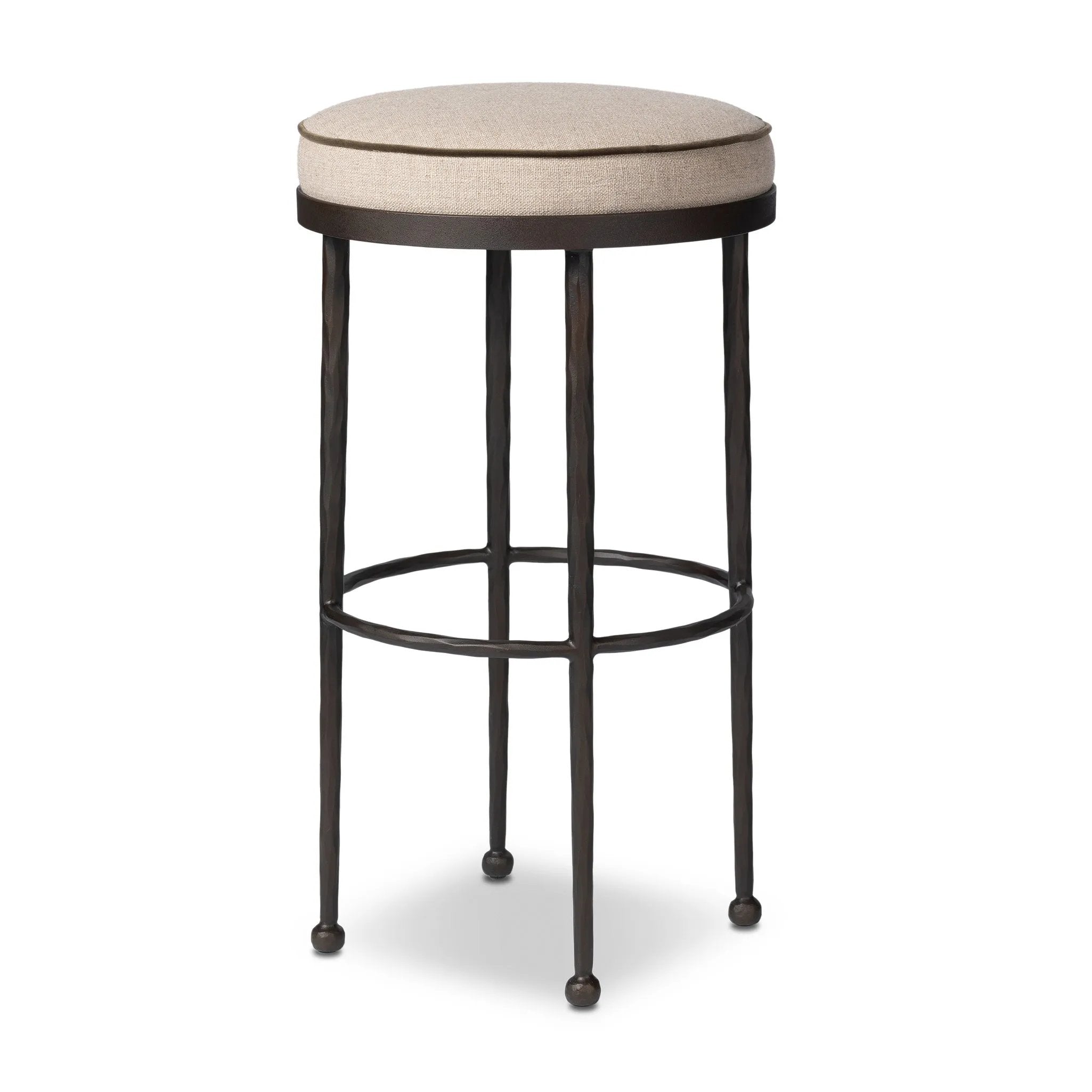 Hammered iron legs with ball-shaped foot details elevate this simply shaped bar stool. A round, cushioned seat upholstered in performance fabric offers a clean, inviting look. Performance fabrics are specially created to withstand spills, stains, high traffic and wear, ensuring long-term comfort and unmatched durability Amethyst Home provides interior design, new home construction design consulting, vintage area rugs, and lighting in the Austin metro area.