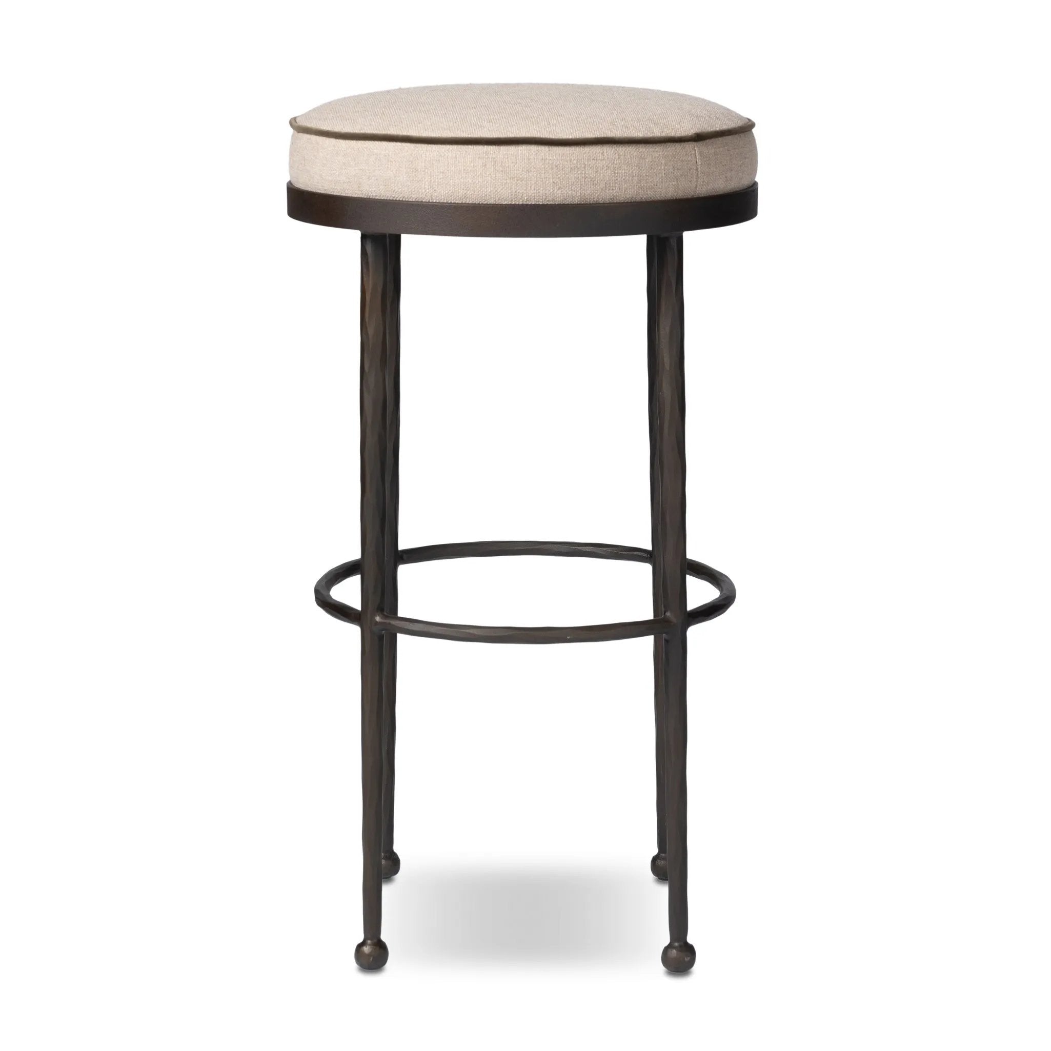 Hammered iron legs with ball-shaped foot details elevate this simply shaped bar stool. A round, cushioned seat upholstered in performance fabric offers a clean, inviting look. Performance fabrics are specially created to withstand spills, stains, high traffic and wear, ensuring long-term comfort and unmatched durability Amethyst Home provides interior design, new home construction design consulting, vintage area rugs, and lighting in the Calabasas metro area.