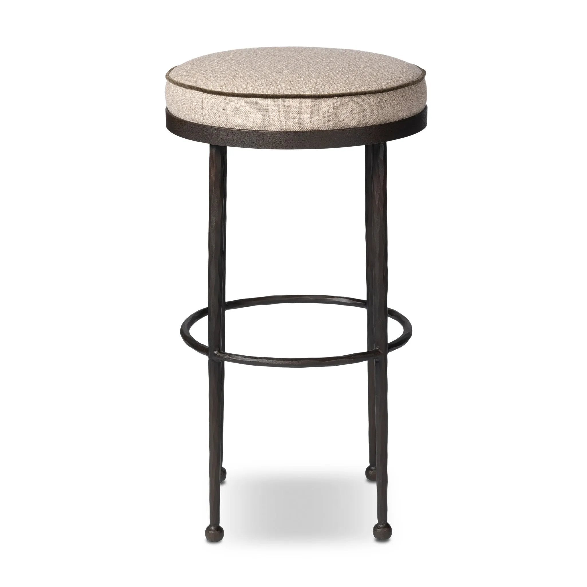 Hammered iron legs with ball-shaped foot details elevate this simply shaped bar stool. A round, cushioned seat upholstered in performance fabric offers a clean, inviting look. Performance fabrics are specially created to withstand spills, stains, high traffic and wear, ensuring long-term comfort and unmatched durability Amethyst Home provides interior design, new home construction design consulting, vintage area rugs, and lighting in the Dallas metro area.
