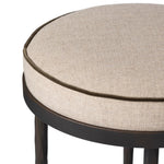 Hammered iron legs with ball-shaped foot details elevate this simply shaped bar stool. A round, cushioned seat upholstered in performance fabric offers a clean, inviting look. Performance fabrics are specially created to withstand spills, stains, high traffic and wear, ensuring long-term comfort and unmatched durability Amethyst Home provides interior design, new home construction design consulting, vintage area rugs, and lighting in the Des Moines metro area.