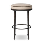 Hammered iron legs with ball-shaped foot details elevate this simply shaped bar stool. A round, cushioned seat upholstered in performance fabric offers a clean, inviting look. Performance fabrics are specially created to withstand spills, stains, high traffic and wear, ensuring long-term comfort and unmatched durability Amethyst Home provides interior design, new home construction design consulting, vintage area rugs, and lighting in the Park City metro area.