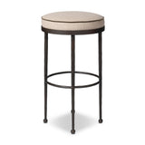 Hammered iron legs with ball-shaped foot details elevate this simply shaped bar stool. A round, cushioned seat upholstered in performance fabric offers a clean, inviting look. Performance fabrics are specially created to withstand spills, stains, high traffic and wear, ensuring long-term comfort and unmatched durability Amethyst Home provides interior design, new home construction design consulting, vintage area rugs, and lighting in the Portland metro area.