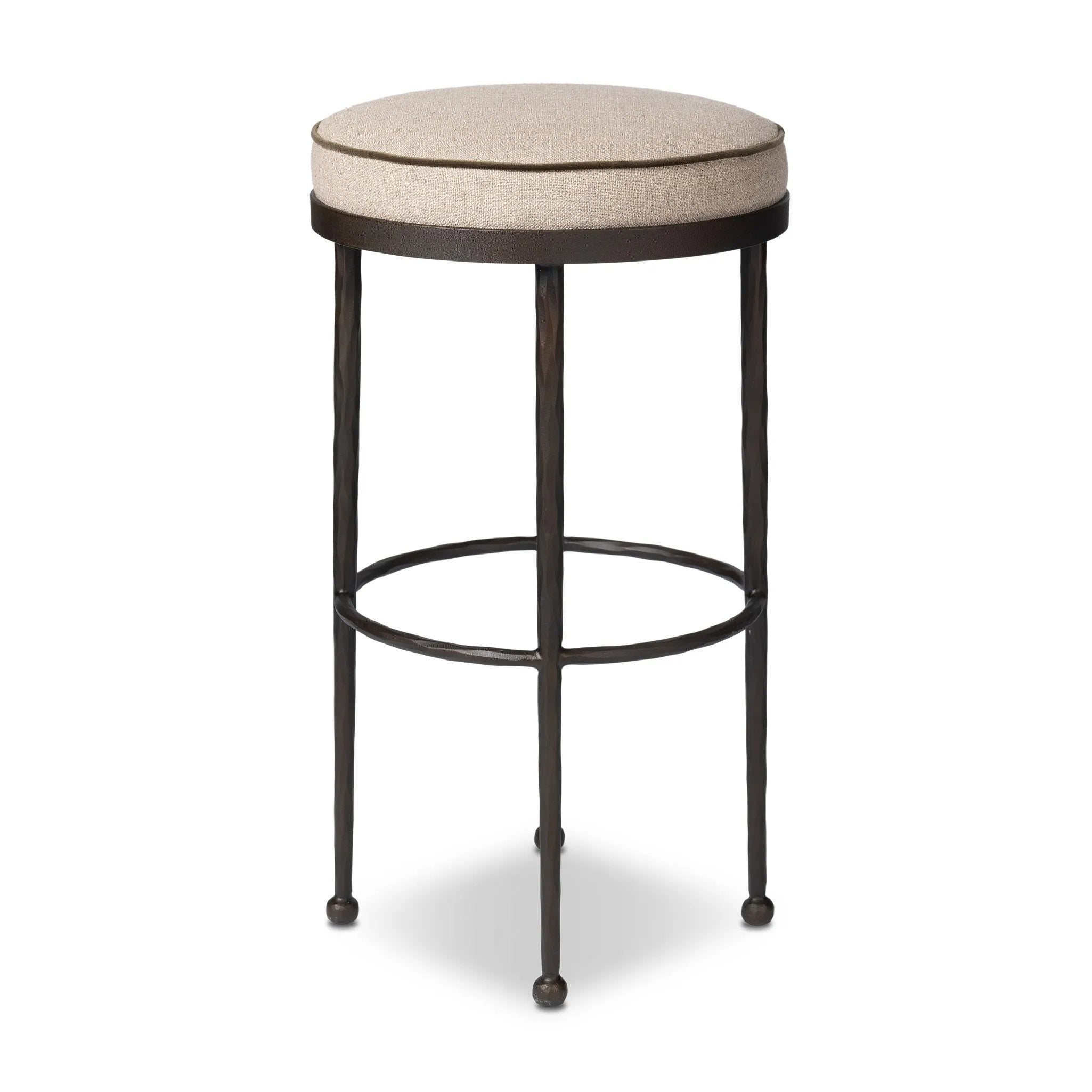 Hammered iron legs with ball-shaped foot details elevate this simply shaped bar stool. A round, cushioned seat upholstered in performance fabric offers a clean, inviting look. Performance fabrics are specially created to withstand spills, stains, high traffic and wear, ensuring long-term comfort and unmatched durability Amethyst Home provides interior design, new home construction design consulting, vintage area rugs, and lighting in the Portland metro area.