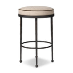 Hammered iron legs with ball-shaped foot details elevate this simply shaped bar stool. A round, cushioned seat upholstered in performance fabric offers a clean, inviting look. Performance fabrics are specially created to withstand spills, stains, high traffic and wear, ensuring long-term comfort and unmatched durability Amethyst Home provides interior design, new home construction design consulting, vintage area rugs, and lighting in the San Diego metro area.