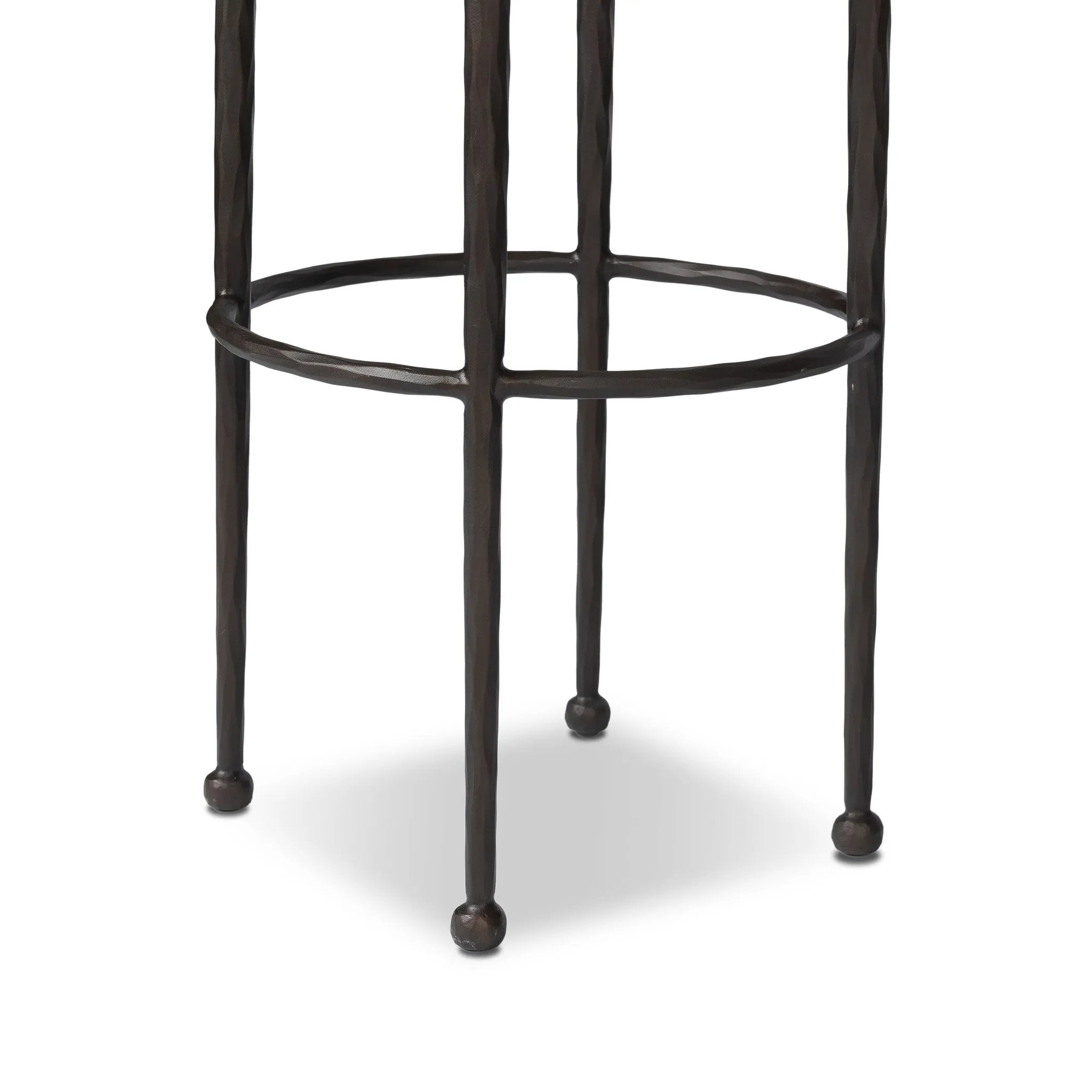 Hammered iron legs with ball-shaped foot details elevate this simply shaped bar stool. A round, cushioned seat upholstered in performance fabric offers a clean, inviting look. Performance fabrics are specially created to withstand spills, stains, high traffic and wear, ensuring long-term comfort and unmatched durability Amethyst Home provides interior design, new home construction design consulting, vintage area rugs, and lighting in the Seattle metro area.
