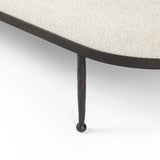 Featuring Corinne Crete Pebble Cocktail Ottoman by Four Hands at Amethyst Home. Place this round ottoman just about anywhere for a subtle retro vibe. Upholstered in a faux Mongolian shearling with a high pile fur. Parawood legs are wirebrushed for a warm, vintage feel.Overall Dimensions: 65.00"w x 35.00"d x 16.00"hWeight : 70.55 lbsMaterials: 100% Harmolan . Amethyst Home provides interior design, new home construction design consulting, vintage area rugs, and lighting in the San Diego metro area.