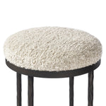 Featuring Corinne Ivan Stone Bar + Counter Stool by Four Hands at Amethyst Home. Hammered bronze legs with ball-shaped foot details elevate this simply shaped counter stool. A round, cushioned seat in a heavy boucle-like fabric finishes this counter-height stool's clean, inviting look.BarOverall Dimensions: 17.00"w x 17.00"d x 31.25"hWeight: 32.19 lbsCounte. Amethyst Home provides interior design, new home construction design consulting, vintage area rugs, and lighting in the Calabasas metro area.