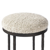 Featuring Corinne Ivan Stone Bar + Counter Stool by Four Hands at Amethyst Home. Hammered bronze legs with ball-shaped foot details elevate this simply shaped counter stool. A round, cushioned seat in a heavy boucle-like fabric finishes this counter-height stool's clean, inviting look.BarOverall Dimensions: 17.00"w x 17.00"d x 31.25"hWeight: 32.19 lbsCounte. Amethyst Home provides interior design, new home construction design consulting, vintage area rugs, and lighting in the Calabasas metro area.