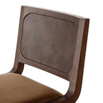 A midcentury look, refreshed with mixed materials.  Solid oak and poplar burl veneer frame a velvety ochre seat. Performance fabrics are specially created to withstand spills, stains, high traffic and wear, ensuring long-term comfort and unmatched durability. Amethyst Home provides interior design, new home construction design consulting, vintage area rugs, and lighting in the Miami metro area.
