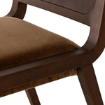 A midcentury look, refreshed with mixed materials.  Solid oak and poplar burl veneer frame a velvety ochre seat. Performance fabrics are specially created to withstand spills, stains, high traffic and wear, ensuring long-term comfort and unmatched durability. Amethyst Home provides interior design, new home construction design consulting, vintage area rugs, and lighting in the Nashville metro area.