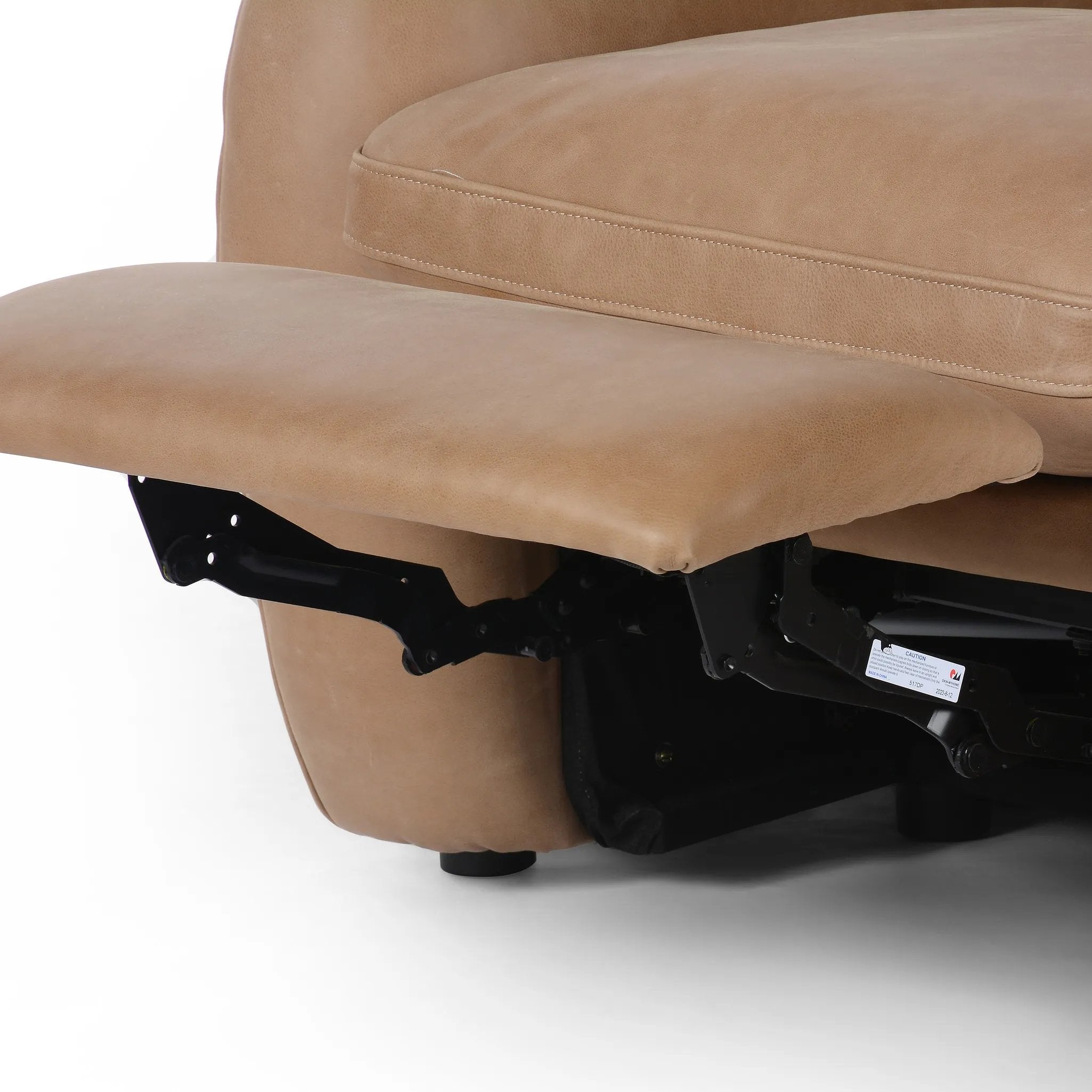 A modern take on the classic recliner. Customize your comfort level with the push of hidden buttons with pieces in our Power Motion collection. Made from caramel top-grain leather, with fiber-and-feather blend cushions plus web suspension for a plush, sink-in experience. A deployable footrest meets luxury with comfort Amethyst Home provides interior design, new home construction design consulting, vintage area rugs, and lighting in the Boston metro area.