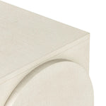 Talk about novelty. Made from painted linen in a light ivory, arched legs soften otherwise clean, modern shaping. Three drawers bring bonus storage space to the living or media room, while half-moon iron hardware adds a hint of art deco style Amethyst Home provides interior design, new home construction design consulting, vintage area rugs, and lighting in the Dallas metro area.