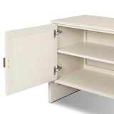 Talk about novelty. Made from painted linen in a light ivory, arched legs soften otherwise clean, modern shaping. Finished in an antique brass, half-moon iron hardware completes this media storage look. Dual rear cutouts for cord management Amethyst Home provides interior design, new home construction design consulting, vintage area rugs, and lighting in the Alpharetta metro area.