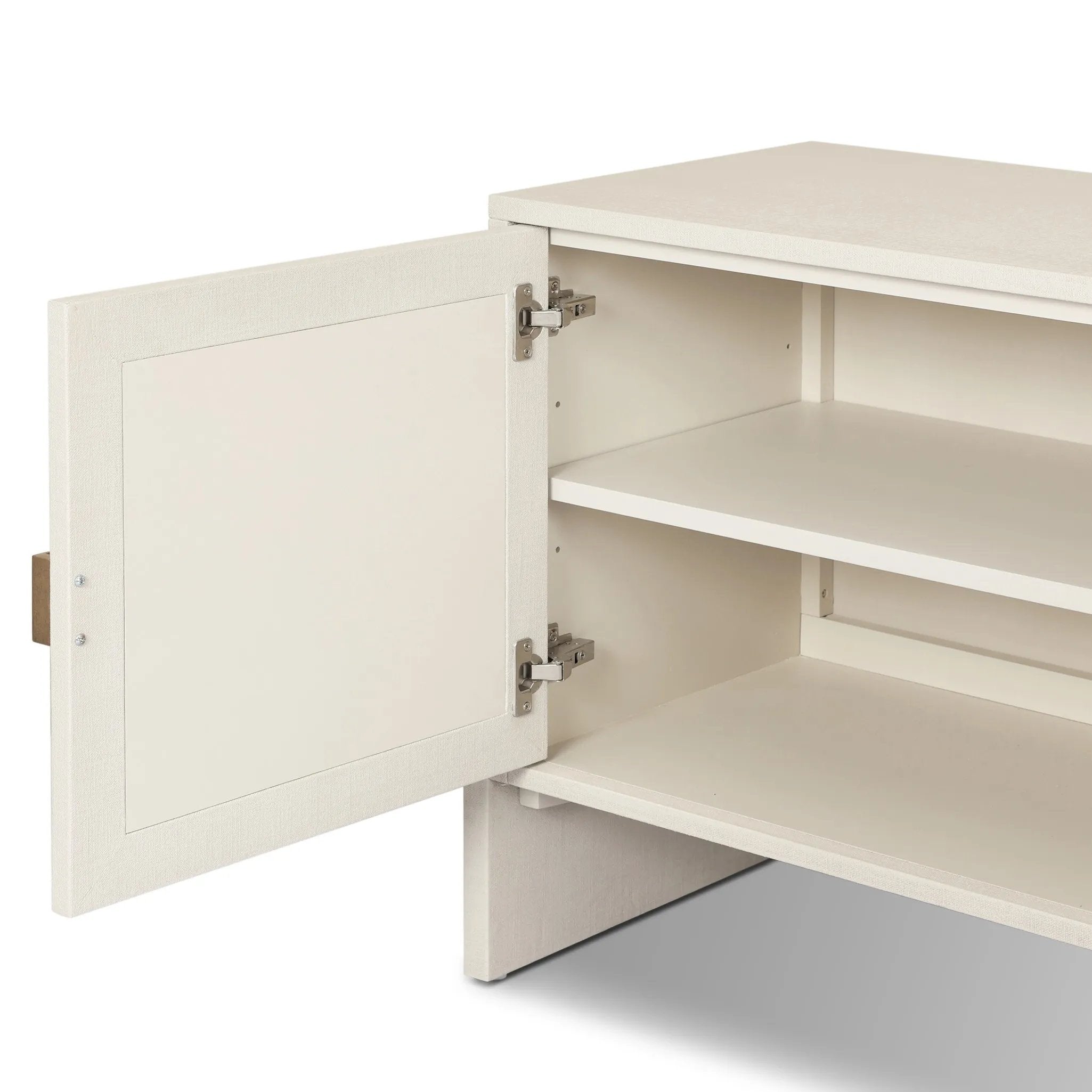 Talk about novelty. Made from painted linen in a light ivory, arched legs soften otherwise clean, modern shaping. Finished in an antique brass, half-moon iron hardware completes this media storage look. Dual rear cutouts for cord management Amethyst Home provides interior design, new home construction design consulting, vintage area rugs, and lighting in the Alpharetta metro area.