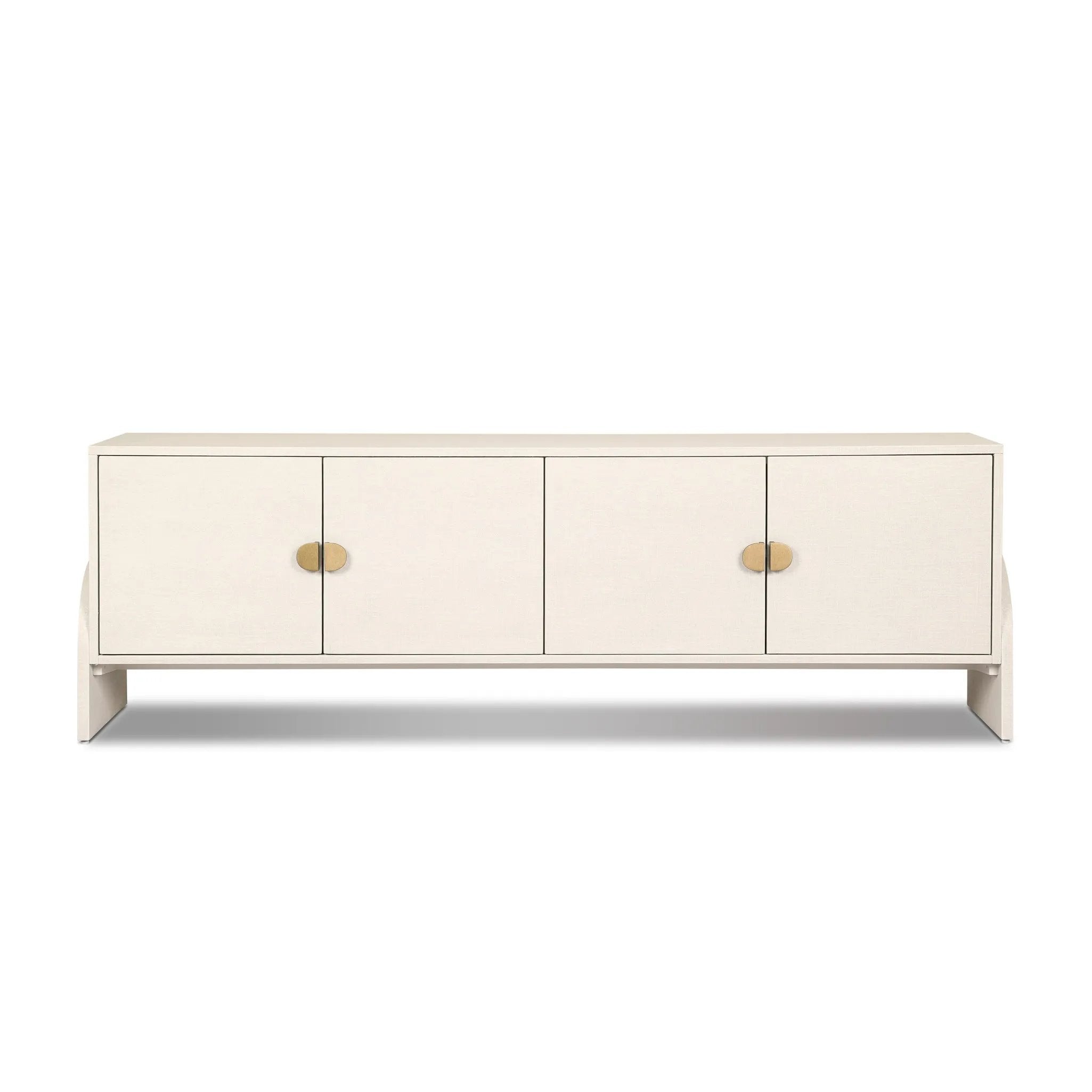 Talk about novelty. Made from painted linen in a light ivory, arched legs soften otherwise clean, modern shaping. Finished in an antique brass, half-moon iron hardware completes this media storage look. Dual rear cutouts for cord management Amethyst Home provides interior design, new home construction design consulting, vintage area rugs, and lighting in the Los Angeles metro area.