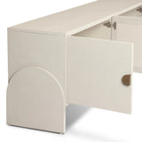 Talk about novelty. Made from painted linen in a light ivory, arched legs soften otherwise clean, modern shaping. Finished in an antique brass, half-moon iron hardware completes this media storage look. Dual rear cutouts for cord management Amethyst Home provides interior design, new home construction design consulting, vintage area rugs, and lighting in the Tampa metro area.