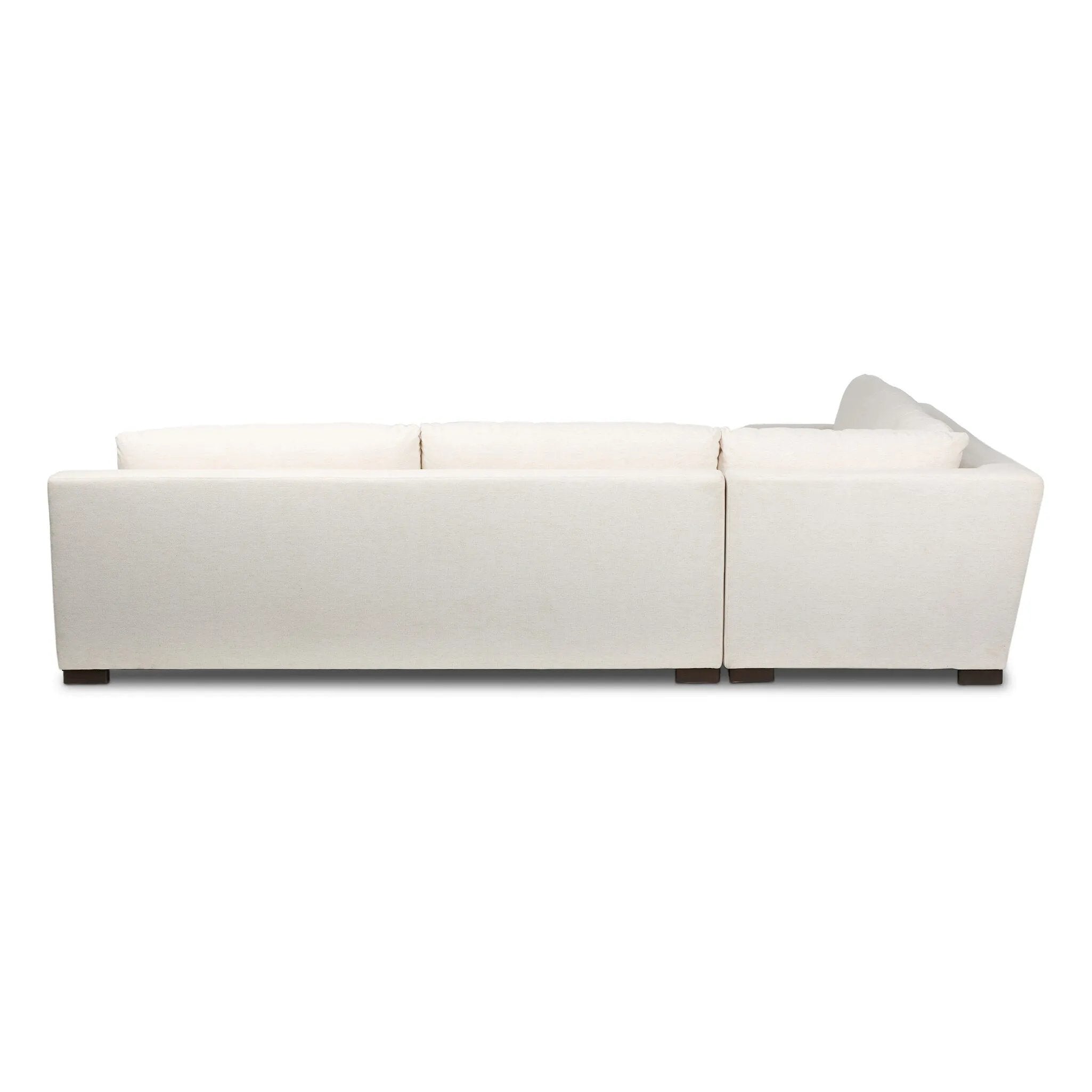 Modern shaping meets sink-in comfort for a piece that invites you and your guests to stay a little longer. The wide arms, slightly angled back and rectilinear edges on this three-piece sectional are softened with T-shaped cushions and an exaggerated bench-style seating in soft foam. Amethyst Home provides interior design, new home construction design consulting, vintage area rugs, and lighting in the Kansas City metro area.