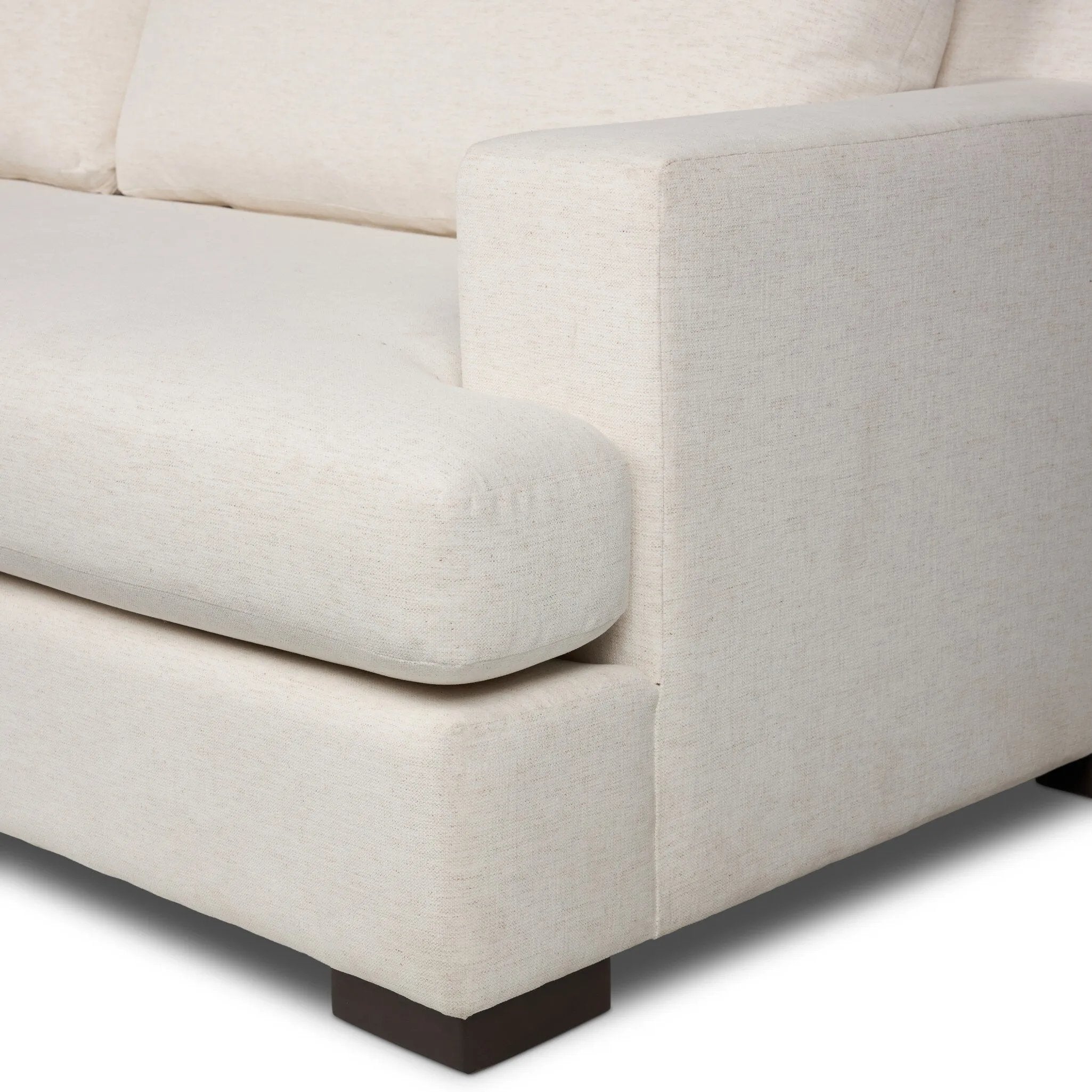 Modern shaping meets sink-in comfort for a piece that invites you and your guests to stay a little longer. The wide arms, slightly angled back and rectilinear edges on this three-piece sectional are softened with T-shaped cushions and an exaggerated bench-style seating in soft foam. Amethyst Home provides interior design, new home construction design consulting, vintage area rugs, and lighting in the Monterey metro area.