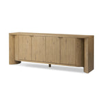 A playful placement of rounded shapes and clean lines, this sideboard captivates with half-cylinder legs seamlessly blending into the storage case and top, complete with curved metal hardware. Finished in light oak for warm, light look that can move between styles with ease Amethyst Home provides interior design, new home construction design consulting, vintage area rugs, and lighting in the Austin metro area.