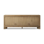 A playful placement of rounded shapes and clean lines, this sideboard captivates with half-cylinder legs seamlessly blending into the storage case and top, complete with curved metal hardware. Finished in light oak for warm, light look that can move between styles with ease Amethyst Home provides interior design, new home construction design consulting, vintage area rugs, and lighting in the Calabasas metro area.