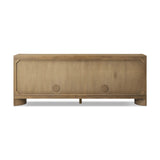 A playful placement of rounded shapes and clean lines, this sideboard captivates with half-cylinder legs seamlessly blending into the storage case and top, complete with curved metal hardware. Finished in light oak for warm, light look that can move between styles with ease Amethyst Home provides interior design, new home construction design consulting, vintage area rugs, and lighting in the Calabasas metro area.