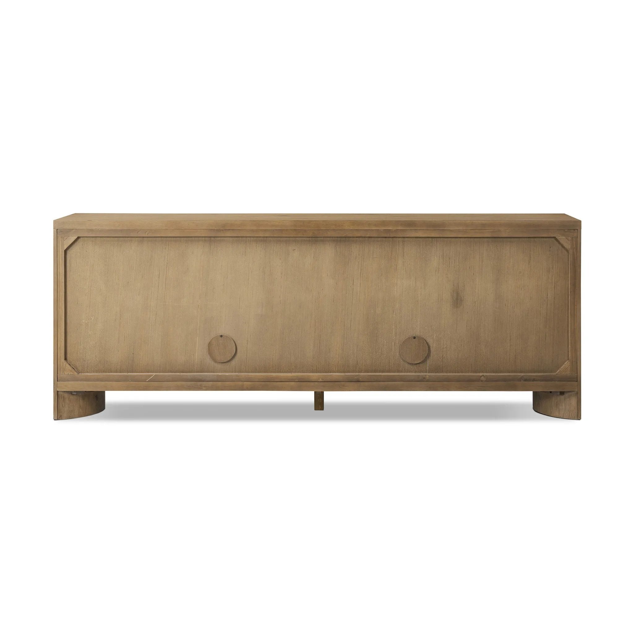 A playful placement of rounded shapes and clean lines, this sideboard captivates with half-cylinder legs seamlessly blending into the storage case and top, complete with curved metal hardware. Finished in light oak for warm, light look that can move between styles with ease Amethyst Home provides interior design, new home construction design consulting, vintage area rugs, and lighting in the Calabasas metro area.