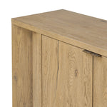 A playful placement of rounded shapes and clean lines, this sideboard captivates with half-cylinder legs seamlessly blending into the storage case and top, complete with curved metal hardware. Finished in light oak for warm, light look that can move between styles with ease Amethyst Home provides interior design, new home construction design consulting, vintage area rugs, and lighting in the Nashville metro area.