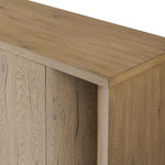 A playful placement of rounded shapes and clean lines, this sideboard captivates with half-cylinder legs seamlessly blending into the storage case and top, complete with curved metal hardware. Finished in light oak for warm, light look that can move between styles with ease Amethyst Home provides interior design, new home construction design consulting, vintage area rugs, and lighting in the Salt Lake City metro area.