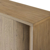 A playful placement of rounded shapes and clean lines, this sideboard captivates with half-cylinder legs seamlessly blending into the storage case and top, complete with curved metal hardware. Finished in light oak for warm, light look that can move between styles with ease Amethyst Home provides interior design, new home construction design consulting, vintage area rugs, and lighting in the Salt Lake City metro area.
