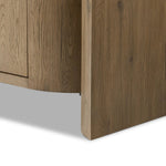 A playful placement of rounded shapes and clean lines, this sideboard captivates with half-cylinder legs seamlessly blending into the storage case and top, complete with curved metal hardware. Finished in light oak for warm, light look that can move between styles with ease Amethyst Home provides interior design, new home construction design consulting, vintage area rugs, and lighting in the Seattle metro area.
