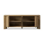 A playful placement of rounded shapes and clean lines, this sideboard captivates with half-cylinder legs seamlessly blending into the storage case and top, complete with curved metal hardware. Finished in light oak for warm, light look that can move between styles with ease Amethyst Home provides interior design, new home construction design consulting, vintage area rugs, and lighting in the Winter Garden metro area.