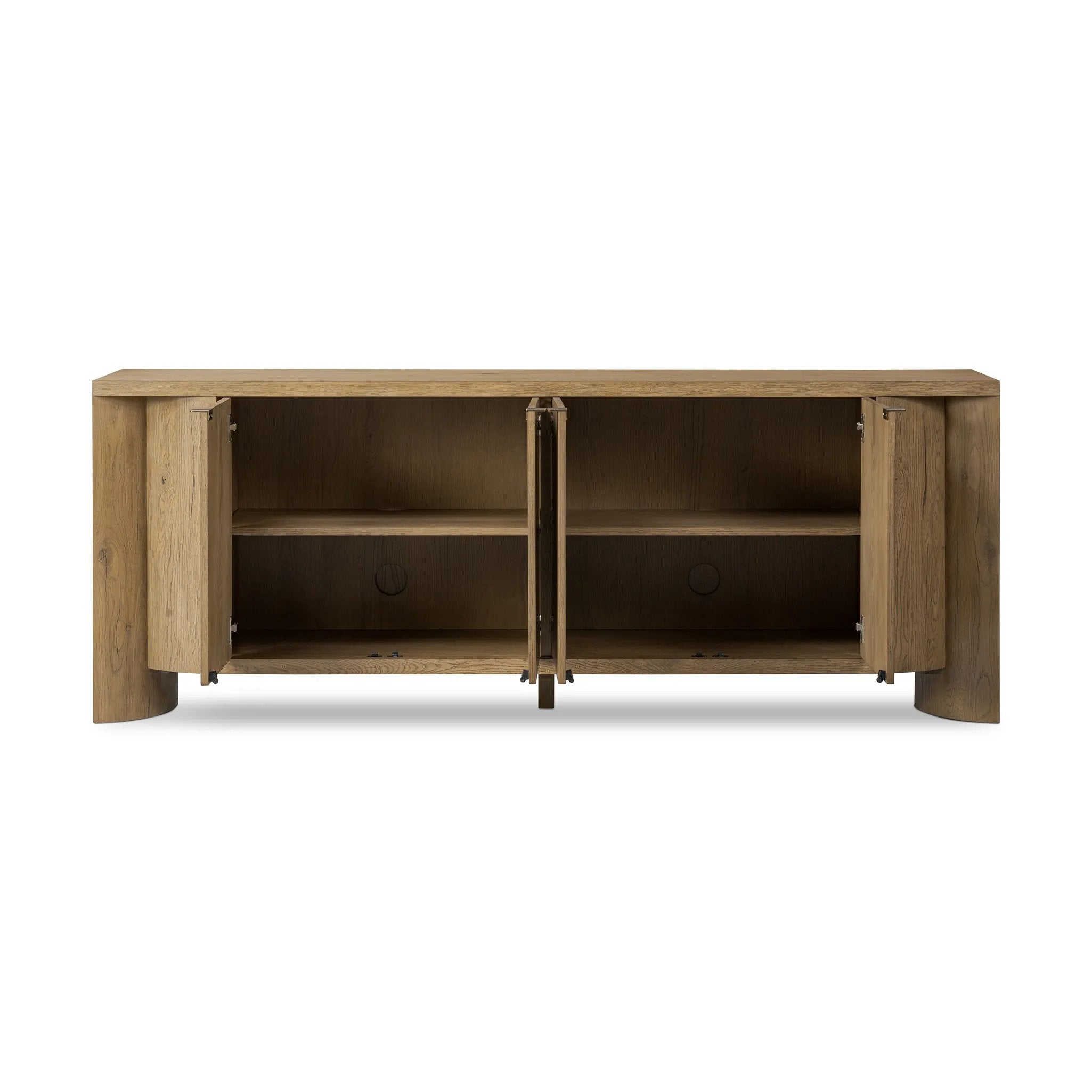 A playful placement of rounded shapes and clean lines, this sideboard captivates with half-cylinder legs seamlessly blending into the storage case and top, complete with curved metal hardware. Finished in light oak for warm, light look that can move between styles with ease Amethyst Home provides interior design, new home construction design consulting, vintage area rugs, and lighting in the Winter Garden metro area.