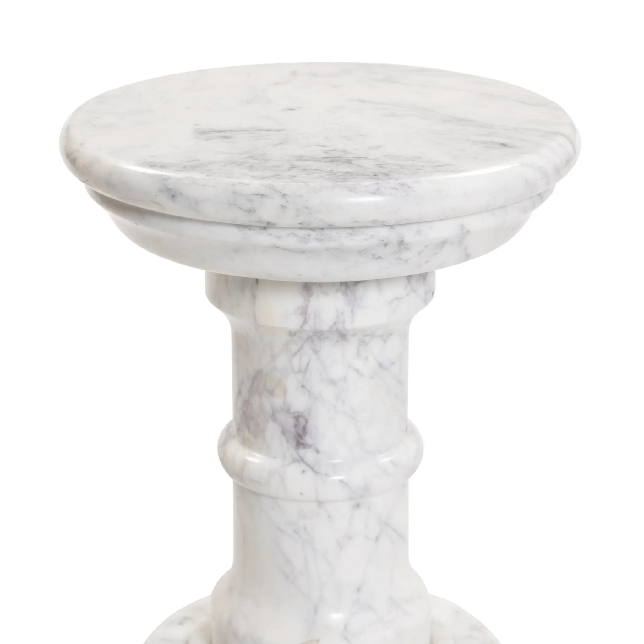 A white marble pedestal features soft curves and stepped details, inspired by classic column design. Polished to a lustrous sheen, natural veining adds depth to this versatile, timeless piece Amethyst Home provides interior design, new home construction design consulting, vintage area rugs, and lighting in the Miami metro area.