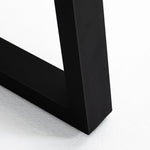 A strikingly simple poly-resin top derived from river sand is polished to a smooth sheen, while an angular black iron base adds architectural appeal to this outdoor-friendly dining table. Slight color variance is to be expected, and speaks to lava stone's organic nature. Cover or store indoors during inclement weather and when not in use. Amethyst Home provides interior design, new home construction design consulting, vintage area rugs, and lighting in the Alpharetta metro area.