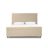 This heritage-style bed reimagines the classic sleigh silhouette. Cream-colored, linen-like fabric slipcover is both removable and washable for practicality. Turned feet in brown parawood peek from under the slip, grounding the bed's stately charm. A design collaboration by Amber Lewis and Four Hands. Amethyst Home provides interior design, new home construction design consulting, vintage area rugs, and lighting in the Charlotte metro area.