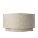 This outdoor fire table is a welcoming centerpiece designed for gathering. Made from glass-reinforced concrete, each piece is naturally finished with deep tones of pewter and dark grey. The monolithic shape is completed with lavastones in the center, bringing together a bold, monochromatic look. Amethyst Home provides interior design, new home construction design consulting, vintage area rugs, and lighting in the Miami metro area.