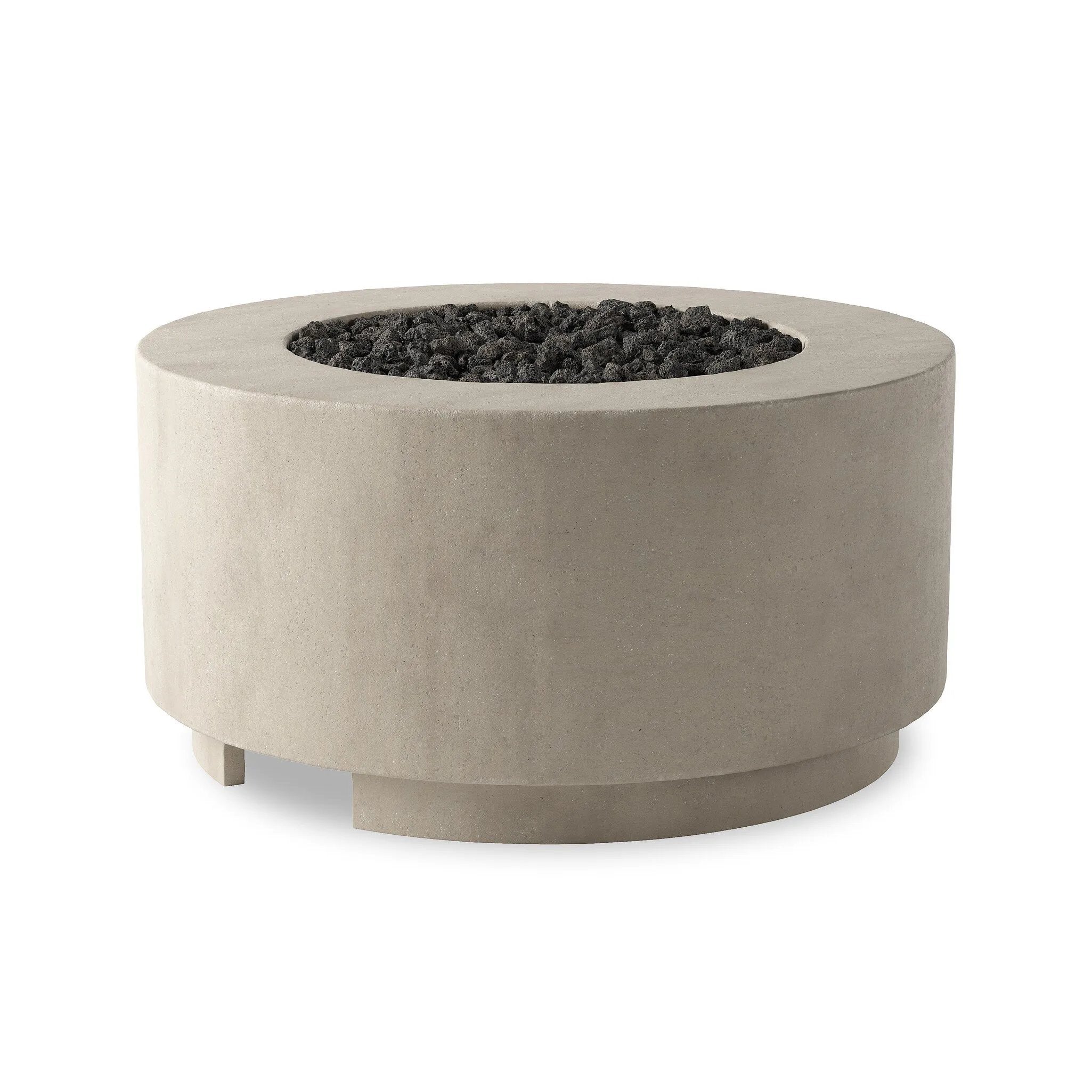 This outdoor fire table is a welcoming centerpiece designed for gathering. Made from glass-reinforced concrete, each piece is naturally finished with deep tones of pewter and dark grey. The monolithic shape is completed with lavastones in the center, bringing together a bold, monochromatic look. Amethyst Home provides interior design, new home construction design consulting, vintage area rugs, and lighting in the Nashville metro area.