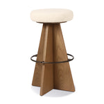 Featuring Damon Durham Cream Swivel Bar + Counter Stool by Four Hands at Amethyst Home. A gorgeous silhouette -- the Damon stool is an Amethyst fave.
Large angular panels merge to form a geometrically inspired base in this modern counter stool. The circle metal ring around the base serves as a footrest, while the round upholstered cushion provides comfortab. Amethyst Home provides interior design, new home construction design consulting, vintage area rugs, and lighting in the Charlotte metro area.