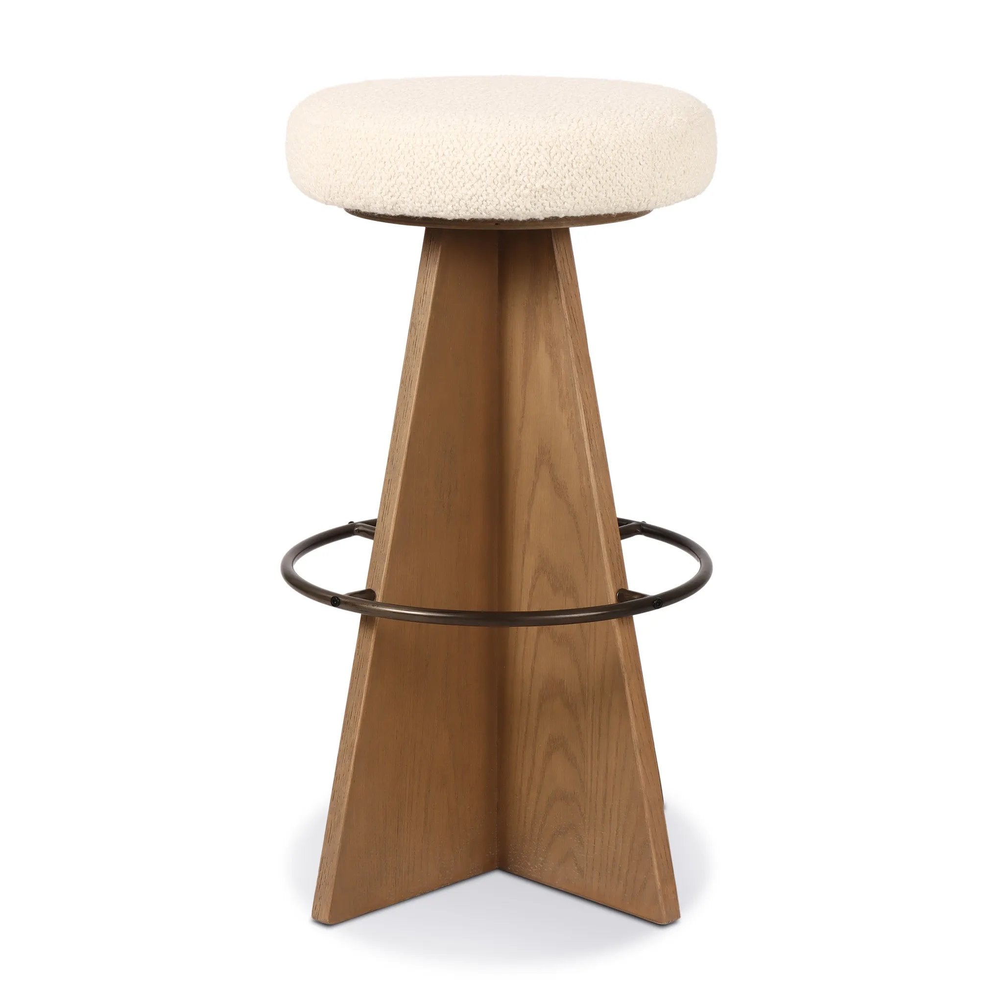 Featuring Damon Durham Cream Swivel Bar + Counter Stool by Four Hands at Amethyst Home. A gorgeous silhouette -- the Damon stool is an Amethyst fave.
Large angular panels merge to form a geometrically inspired base in this modern counter stool. The circle metal ring around the base serves as a footrest, while the round upholstered cushion provides comfortab. Amethyst Home provides interior design, new home construction design consulting, vintage area rugs, and lighting in the San Diego metro area.