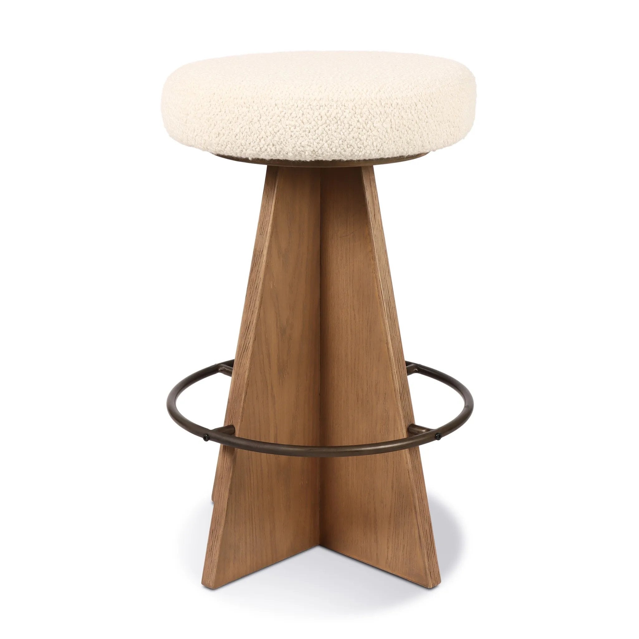 Large angular panels merge to form a geometrically inspired base in this modern counter stool. The circle metal ring around the base serves as a footrest, while the round upholstered cushion provides comfortable seating. The 360-degree swivel function adds versatility, and the combination of wood, metal, and fabric evoke a mixed material moment Amethyst Home provides interior design, new home construction design consulting, vintage area rugs, and lighting in the Winter Garden metro area.